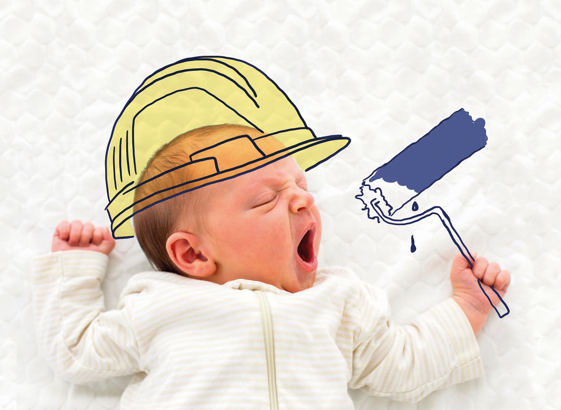 Baby mit Anstreicherrolle und Schutzhelm